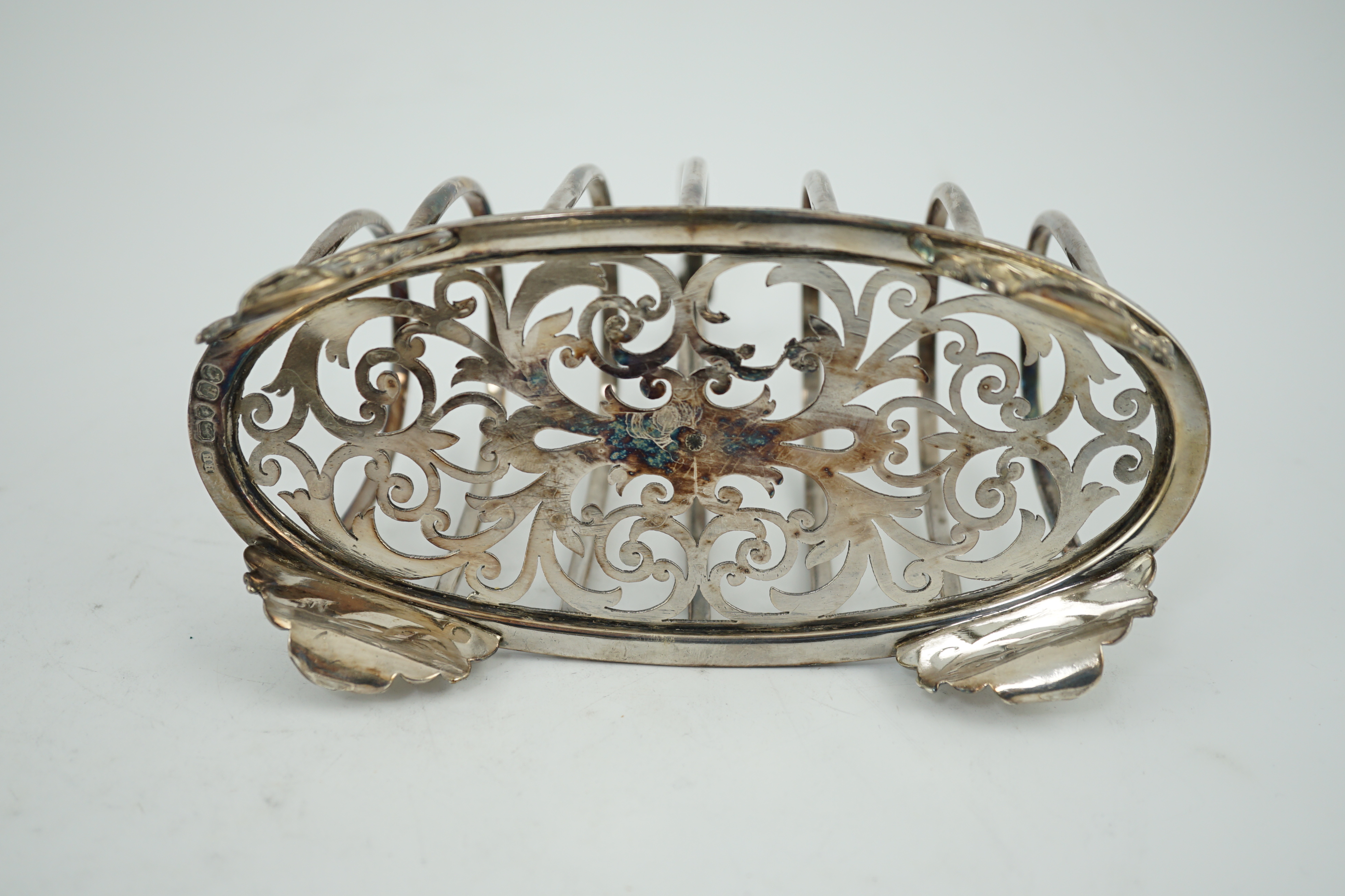 A Victorian silver seven bar toast rack, by Henry Holland